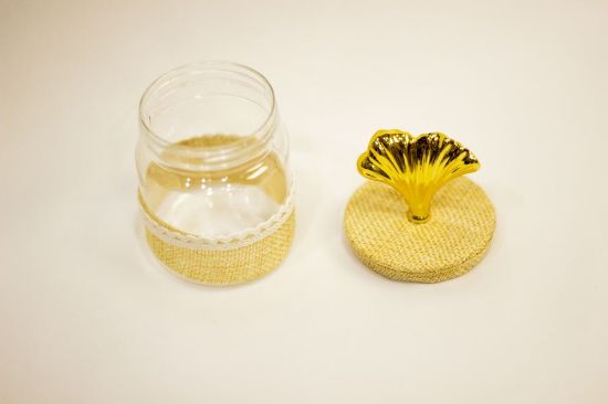 صورة علب مكسرات بلاستيك دائري